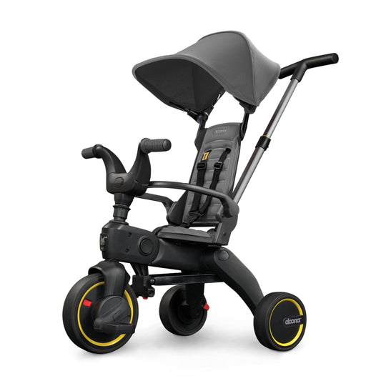 Doona Liki Trike S1 grey foldable toddler trike with parent steering handle and canopy
