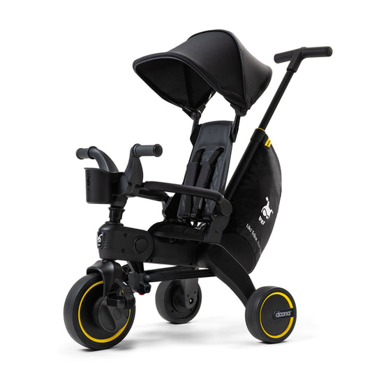 Doona Liki Trike S5 Midnight Limited Edition foldable toddler trike with black frame and parent handle