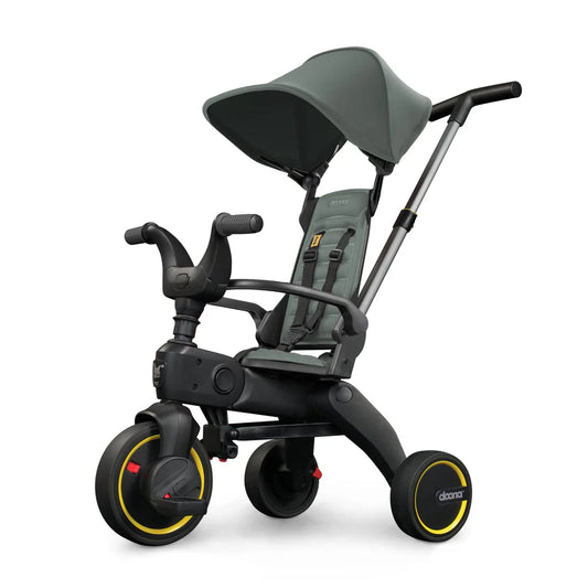 Doona Liki Trike S1 blush pink foldable toddler trike with parent steering handle and canopy